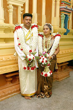 indian couple at temple wedding
