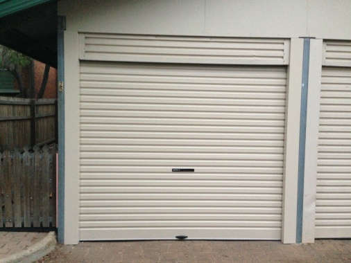 Roller Door with Head panel to neaten up gaps above - 100% Garage Doors