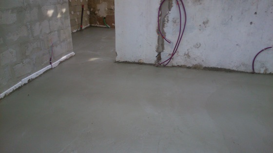 Réfection d'un dallage intérieur en béton armée.