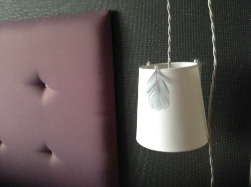Suspension baladeuse "plume" style romantique.