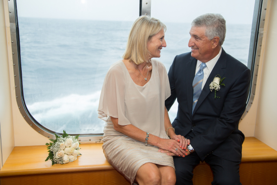 Happy couple at sea.