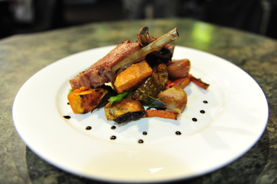 Hot Smoked Lamb Racks on Roast Pumpkin Salad, Rich Pomegranate and Lamb Jus