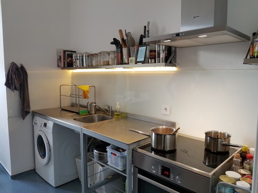 Berlin Sep-2016. 
Measure and install glass splashback, install rangehood, modify shelves, mount cabinets