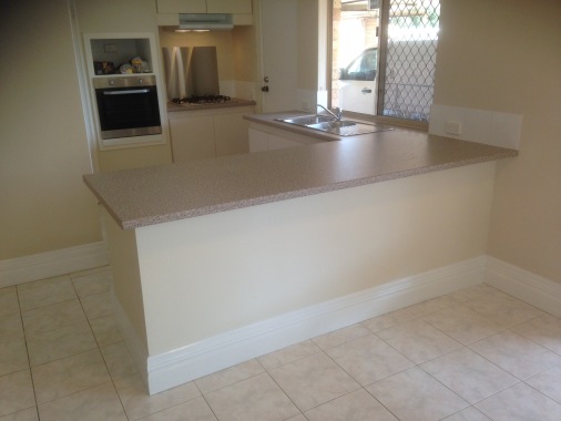After. New main kitchen bench installed.
Brick work covered & new skirting to give a more modern look.