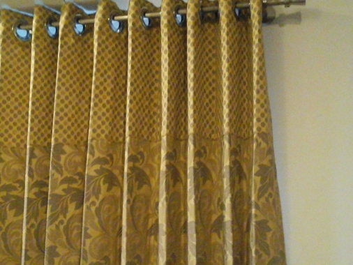Eyelet curtains with border at the top