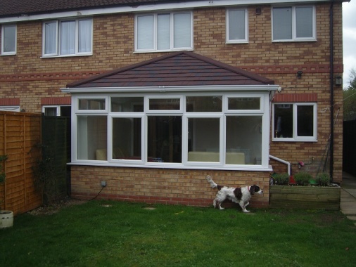 Here we replaced an old polycarbonate roof on the conservatory with a new lightweight, tiled roof. This greatly improved the insulation, meaning the conservatory was now more like an extension and could be used every day of the year
