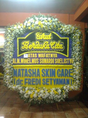 bunga papan dukacita