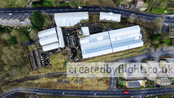 An aerial photograph of an old mill from 400 feet