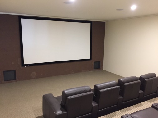 Installing a Projector Screen and a Sony Projector.