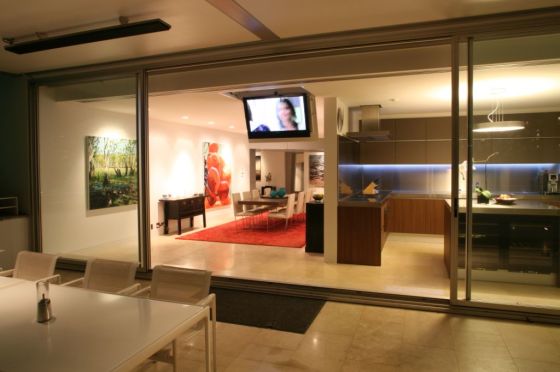 The outdoor alfresco area has its own motorised TV with sound provided by Stealth Acoustics speakers.