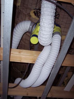 Installation d'une VMC dans les faux plafonds.