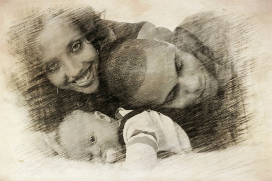 Maël et ses parents pendant une séance photo