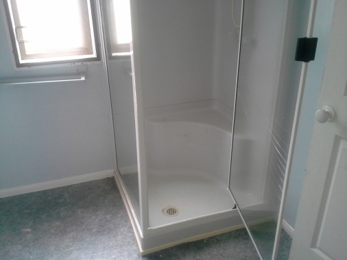 Look how clean this shower was after the Green and Clean Team cleaned it.