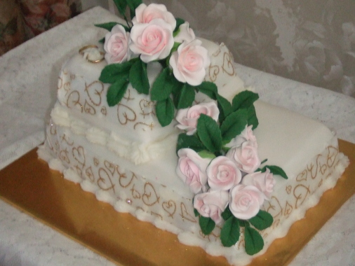 2 tier cake with hand made roses 